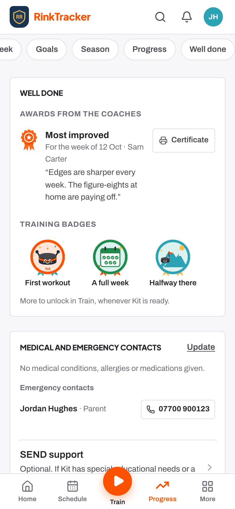 Well done on a phone: an award with its certificate, and training badges.